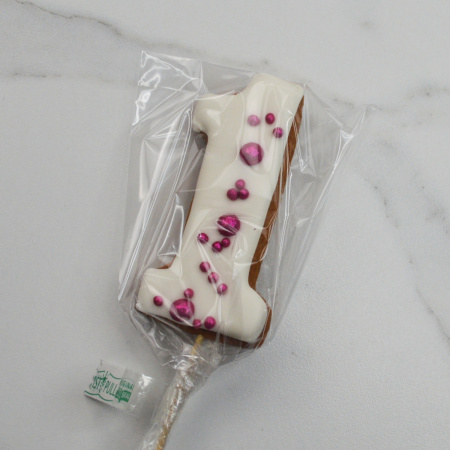 Пряник ЦИФРА "1" с посыпкой РОЗОВЫЙ блеск 9см Пряник ЦИФРА "1" с посыпкой РОЗОВЫЙ блеск 9см